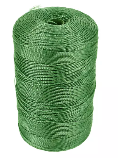 Coiled nylon rope ready for use in marine and outdoor applications, highlighting its flexibility.